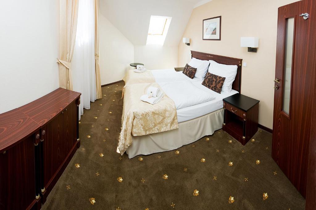 Hotel & Apartments U Cerneho Orla Třebíč Quarto foto