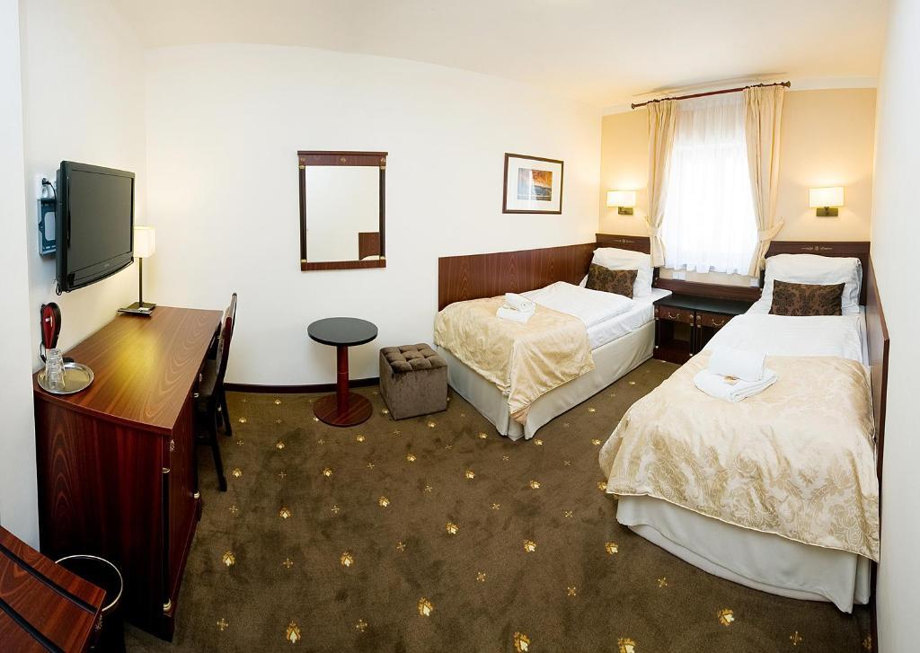 Hotel & Apartments U Cerneho Orla Třebíč Quarto foto